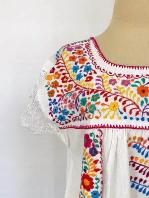 Detalle de la bata Milflores
